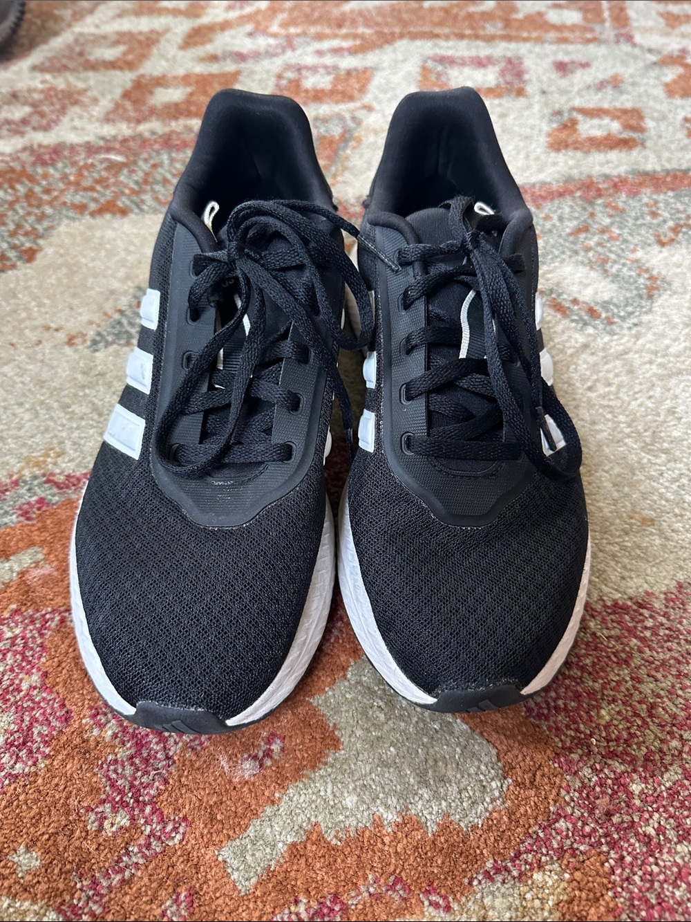 Adidas women’s Black Running Sneakers with White Stripes